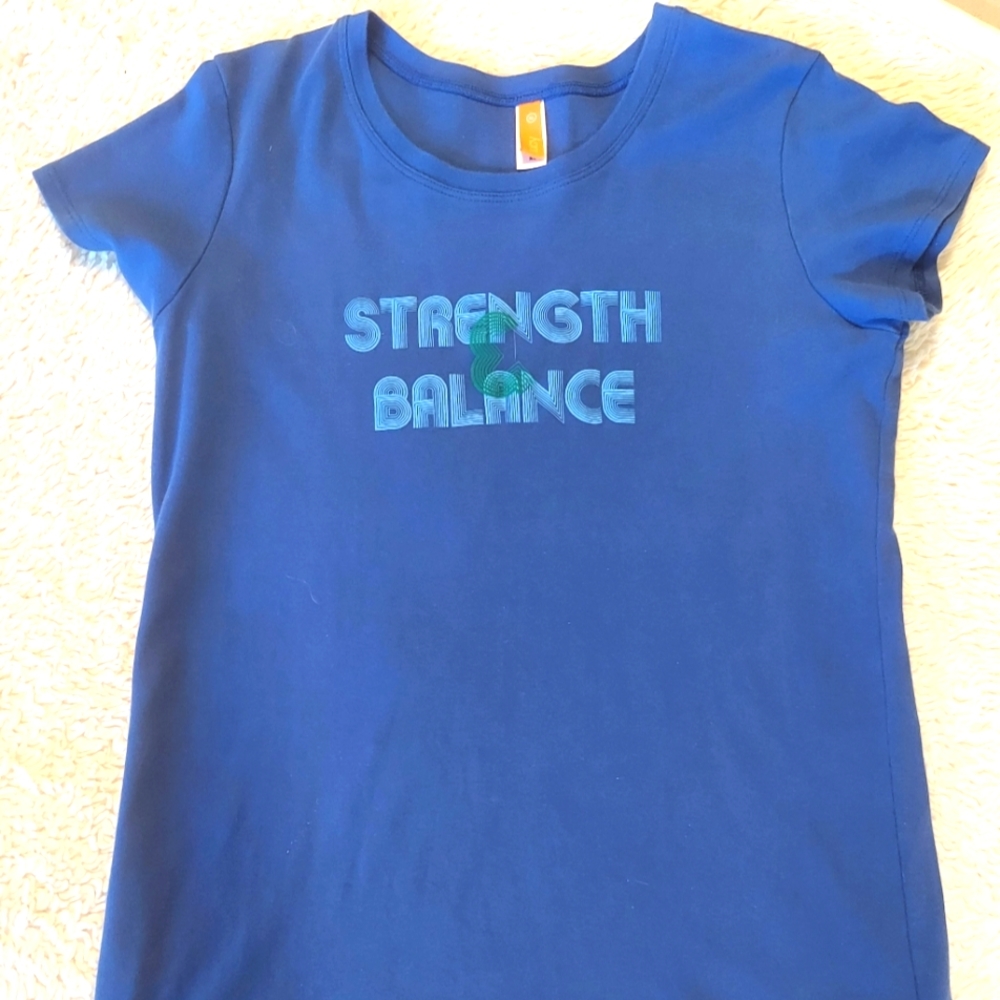 Lucy, "Strength and Balance" Tee size XL in Blue